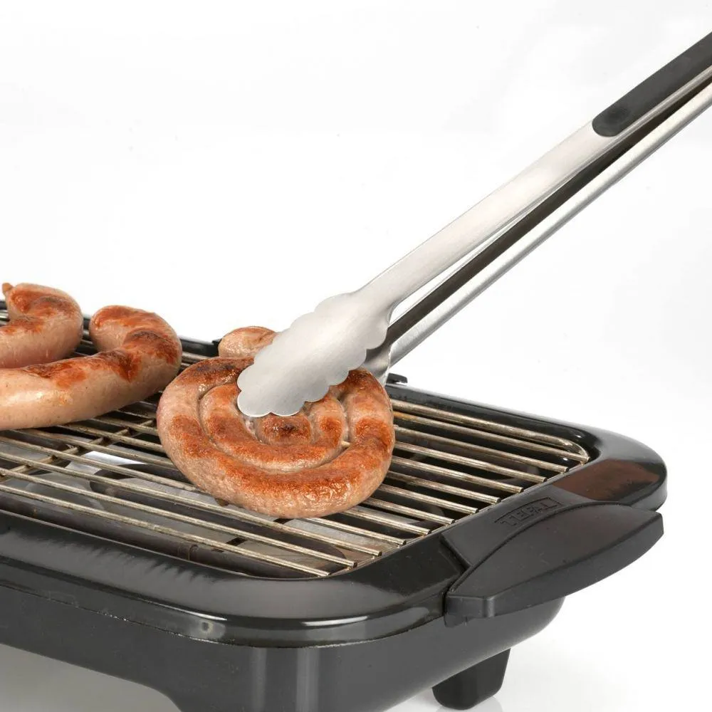 Westmark Grillzange Classic Spezial greift Würstchen auf Grillrost